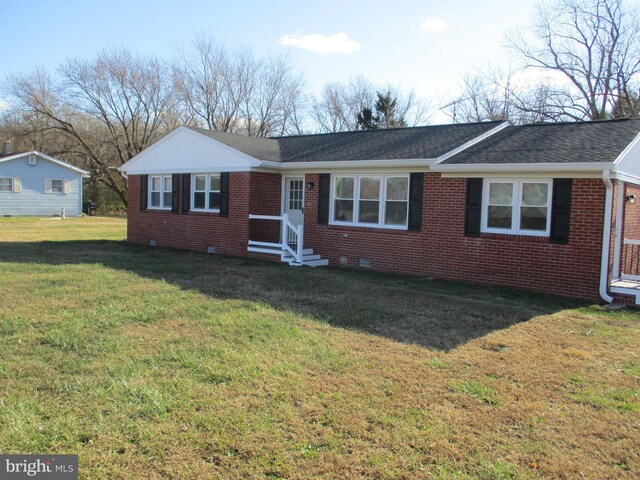 22403 Marsh Creek Rd, Preston, MD 21655 - ranch-style house with brick siding, a front yard, and roof with shingles