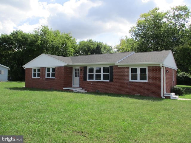 ranch-style house with a front lawn