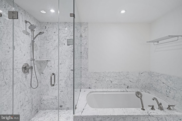 bathroom with independent shower and bath