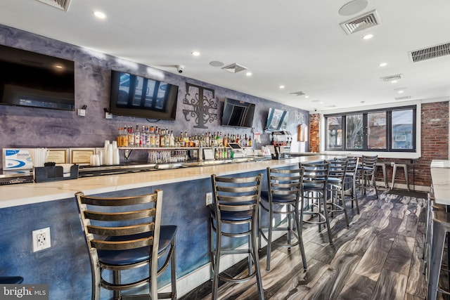 bar featuring wood-type flooring