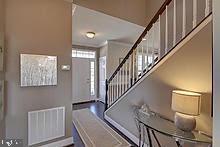 foyer featuring radiator heating unit