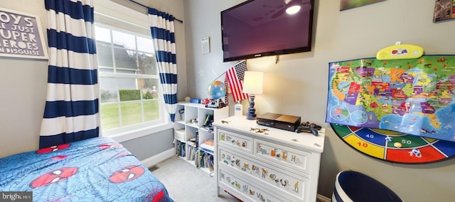 bedroom with light carpet