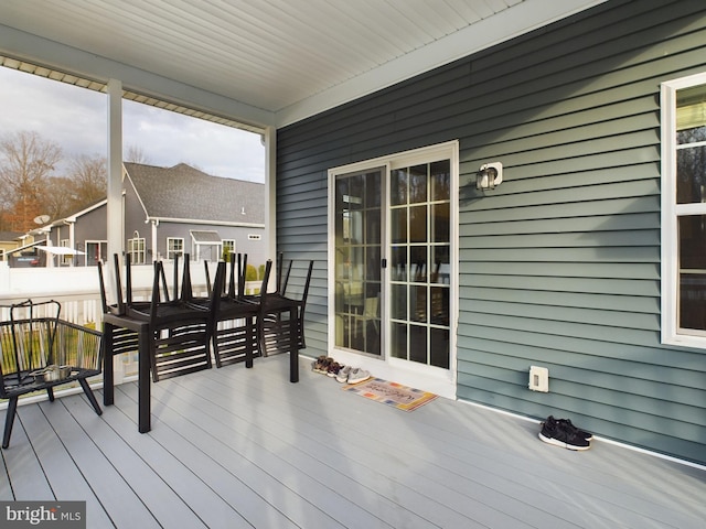 wooden terrace with covered porch