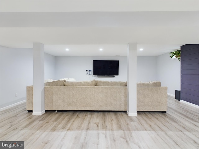 unfurnished living room featuring light wood-type flooring