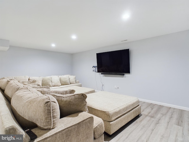 living room with light hardwood / wood-style floors