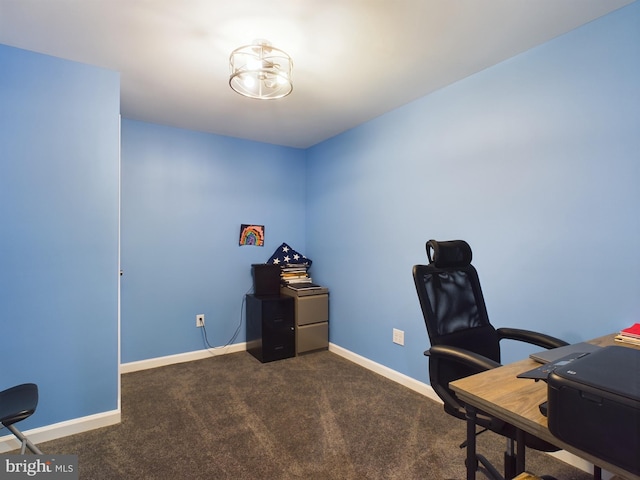 office space with dark colored carpet