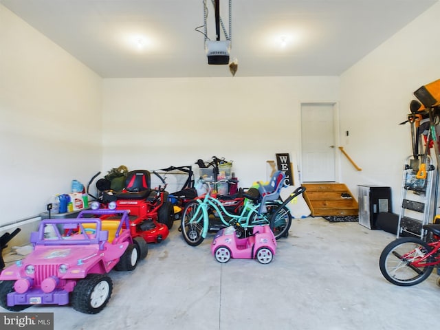 garage featuring a garage door opener