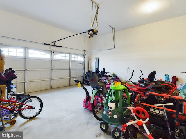 garage featuring a garage door opener