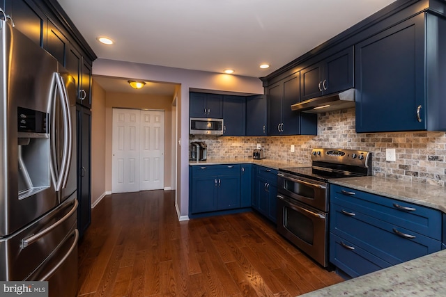 kitchen featuring tasteful backsplash, light stone counters, stainless steel appliances, blue cabinets, and dark hardwood / wood-style floors