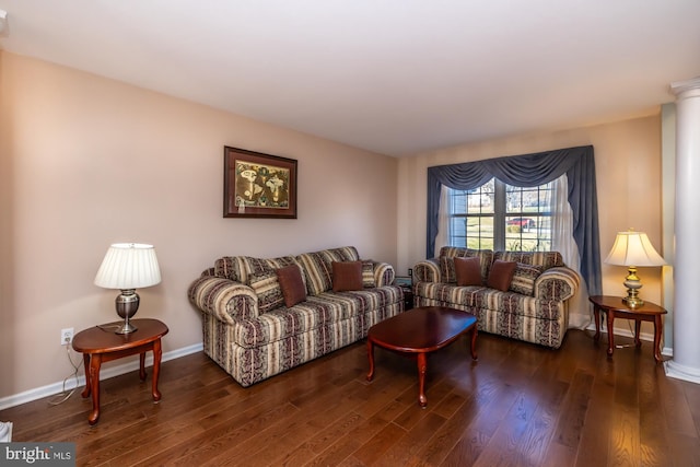 living room featuring dark hardwood / wood-style flooring