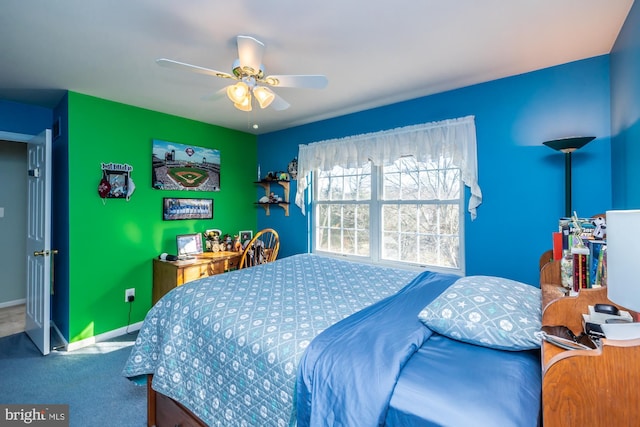 carpeted bedroom featuring ceiling fan