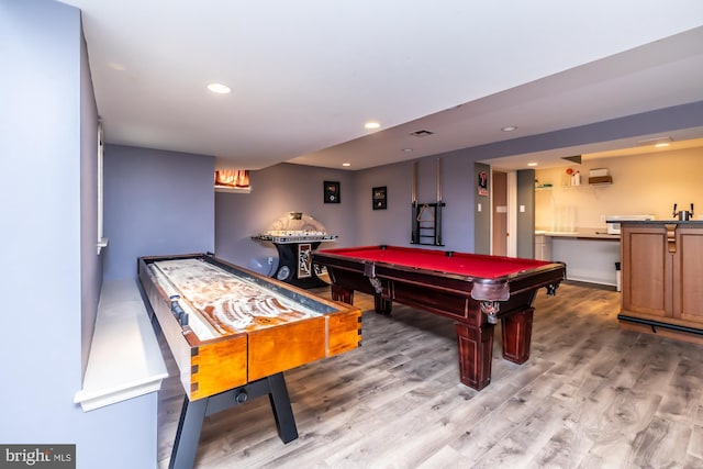 rec room with wood-type flooring and pool table