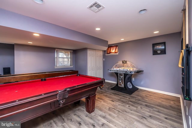 game room with hardwood / wood-style flooring and billiards