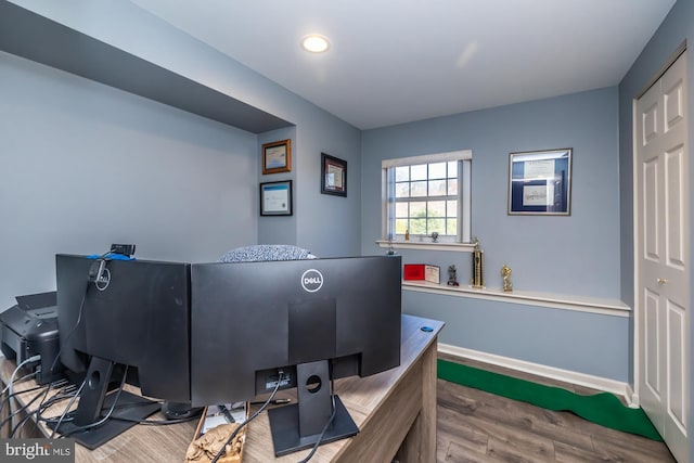 home office featuring hardwood / wood-style floors