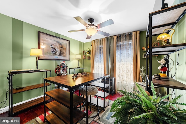 dining room with ceiling fan and hardwood / wood-style floors