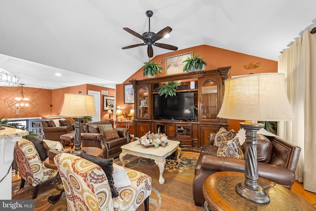 living room featuring ceiling fan with notable chandelier and lofted ceiling