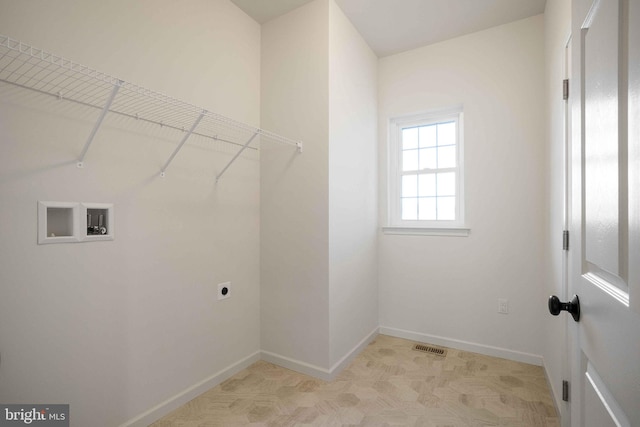 laundry room with washer hookup and hookup for an electric dryer