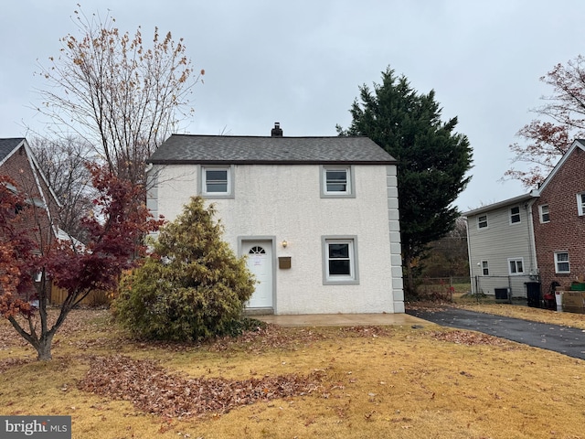 view of front property featuring central AC