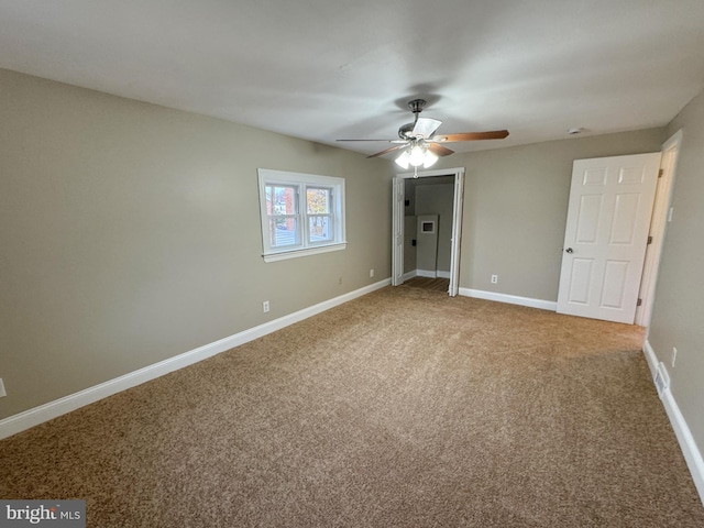 unfurnished bedroom featuring carpet flooring and ceiling fan