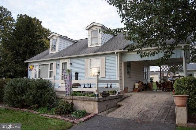 view of new england style home