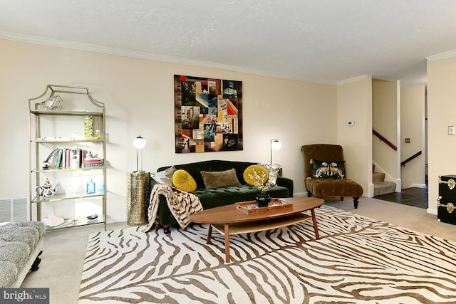 carpeted living room with a textured ceiling and crown molding