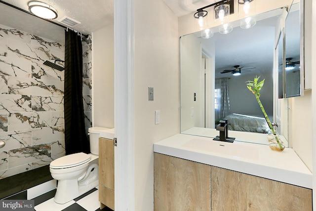 bathroom with ceiling fan, curtained shower, toilet, and vanity