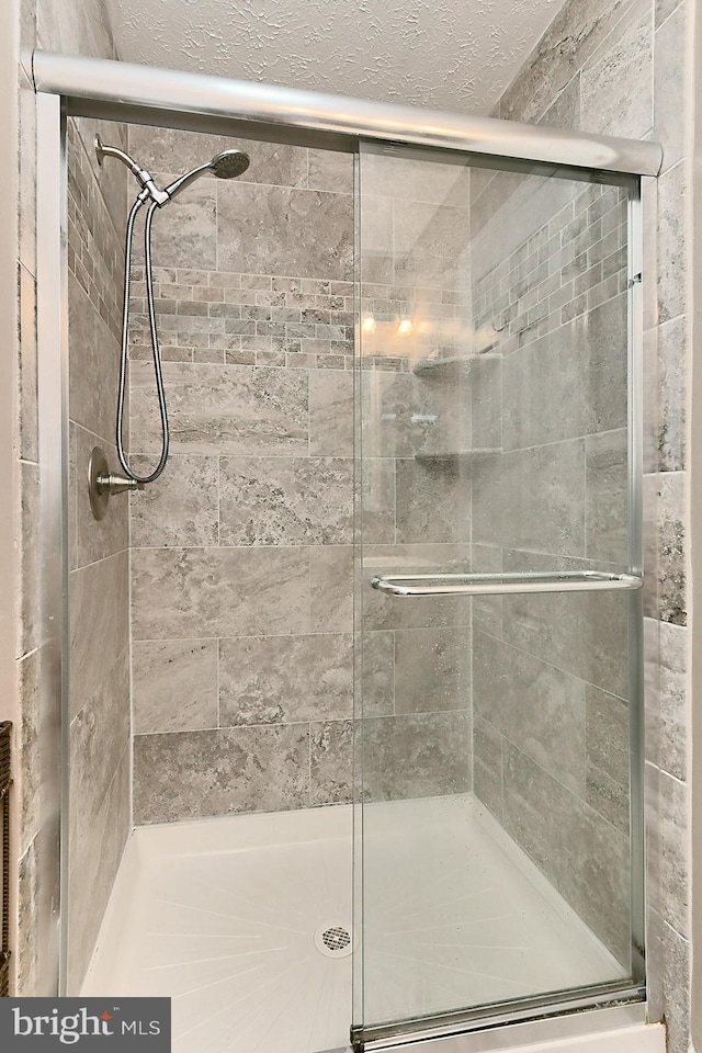 bathroom featuring walk in shower