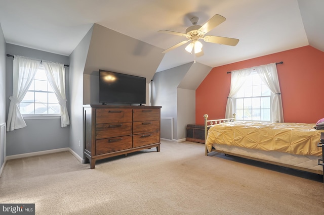 143 Mayor Ln, Felton, DE 19943 - bedroom with vaulted ceiling, multiple windows, light carpet, and ceiling fan