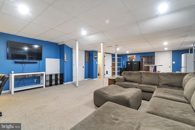 143 Mayor Ln, Felton, DE 19943 - carpeted living area with a paneled ceiling