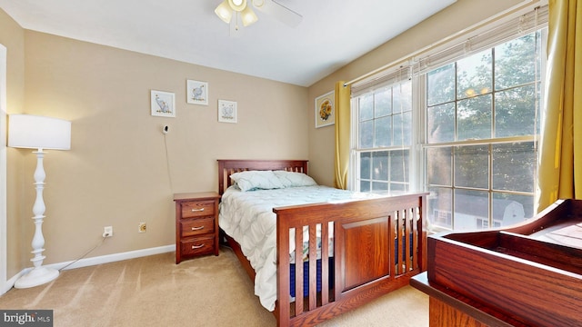 143 Mayor Ln, Felton, DE 19943 - bedroom with multiple windows, light carpet, and a ceiling fan