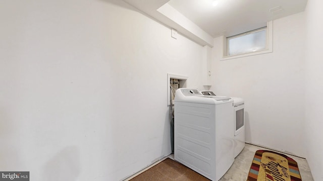 143 Mayor Ln, Felton, DE 19943 - laundry room featuring washer and clothes dryer and light carpet