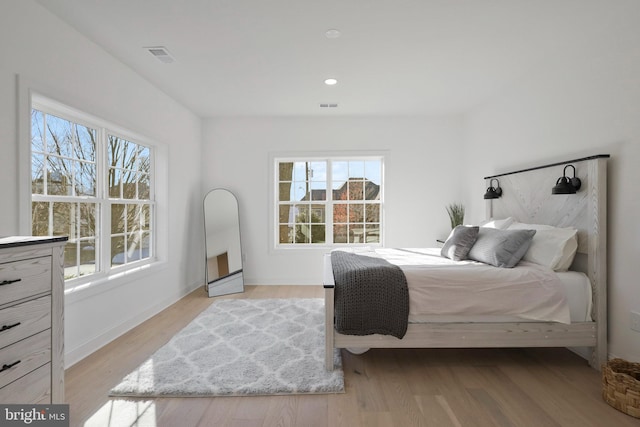 bedroom featuring light hardwood / wood-style flooring