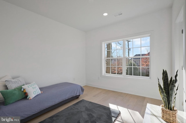 bedroom featuring light wood-type flooring