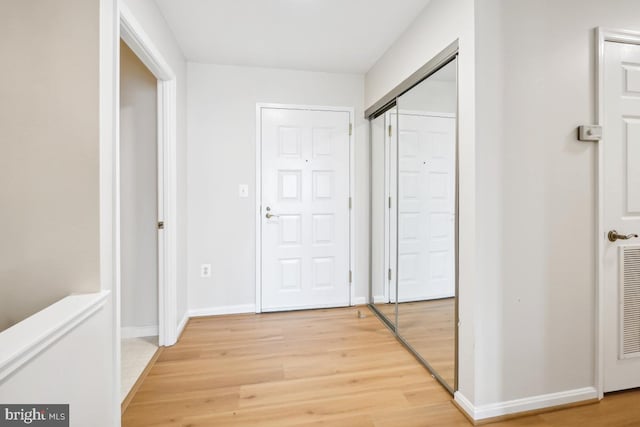 hall featuring light hardwood / wood-style floors