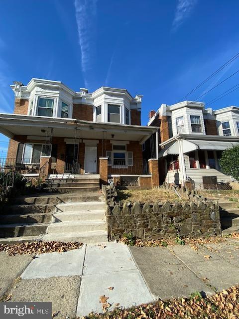 view of property with a porch