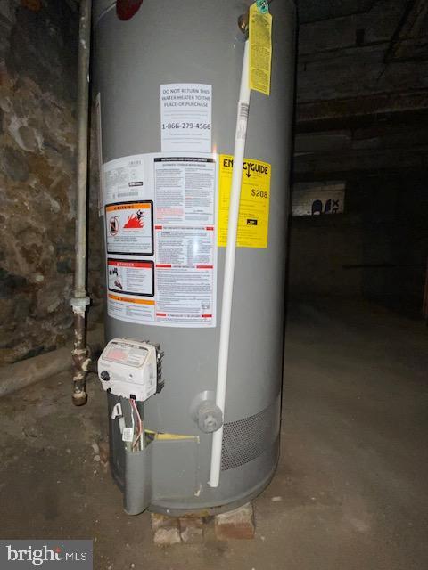 utility room with water heater