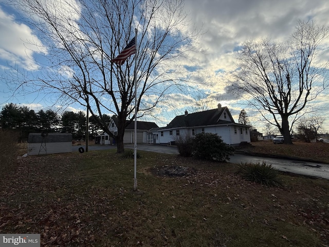 view of side of home with a patio area