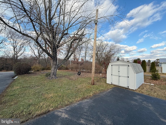 exterior space featuring a storage unit