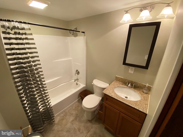 full bathroom featuring toilet, tile patterned floors, vanity, and shower / tub combo with curtain