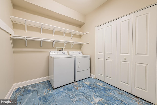 laundry room featuring independent washer and dryer