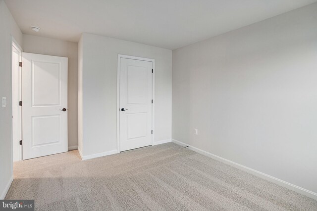 35551 Aspen Way, Locust Grove, VA 22508 - unfurnished bedroom with light colored carpet