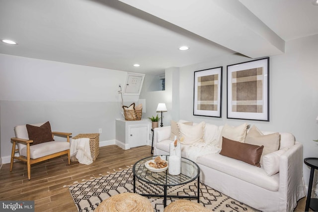 living room with dark hardwood / wood-style flooring