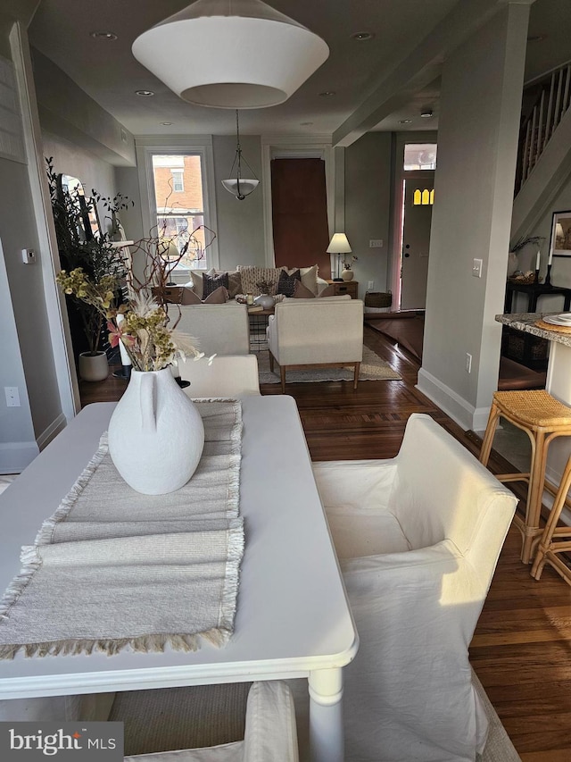 living room with dark wood-type flooring