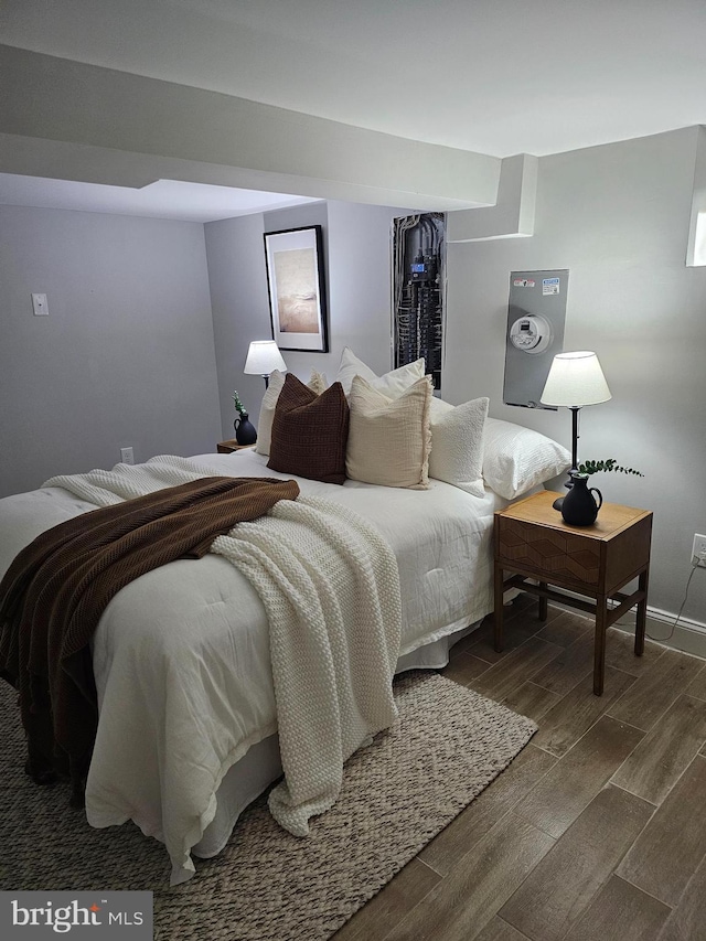 bedroom featuring dark hardwood / wood-style floors