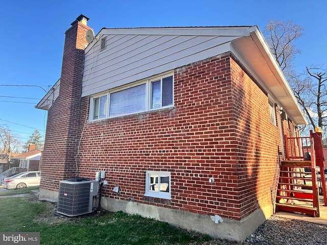 view of home's exterior featuring central AC