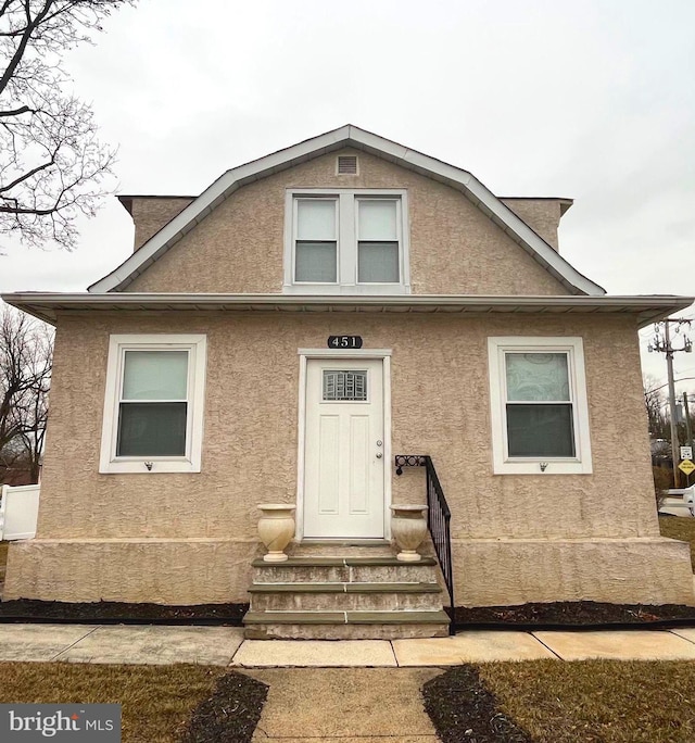 451 Ridge Pike, Lafayette Hill, PA 19444 - colonial inspired home featuring stucco siding and entry steps