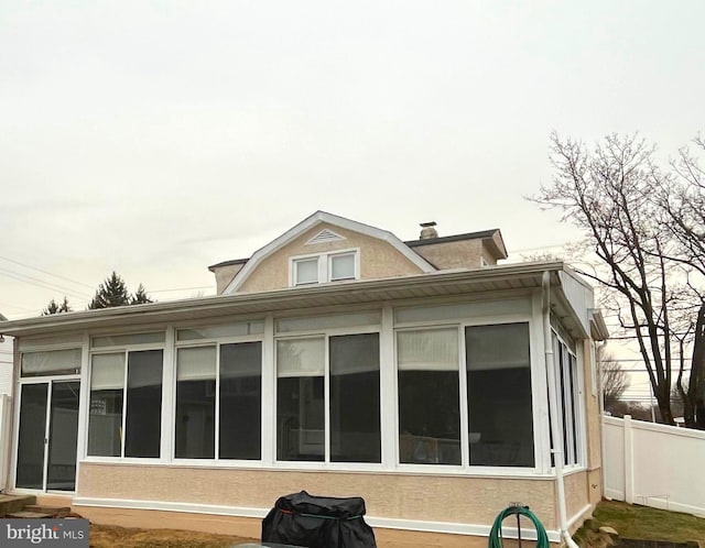 451 Ridge Pike, Lafayette Hill, PA 19444 - back of property with a sunroom and a chimney