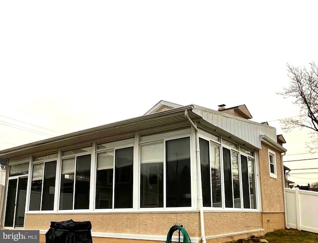 451 Ridge Pike, Lafayette Hill, PA 19444 - view of side of property featuring a sunroom and stucco siding