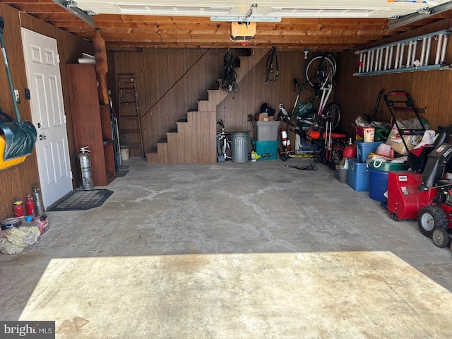 451 Ridge Pike, Lafayette Hill, PA 19444 - garage featuring wood walls and a garage door opener
