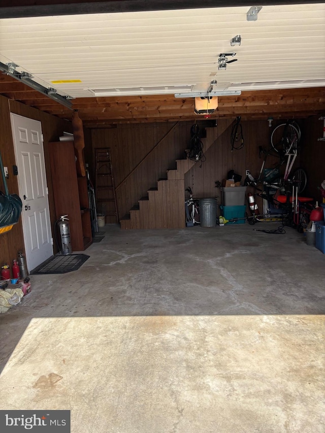 451 Ridge Pike, Lafayette Hill, PA 19444 - garage with wooden walls and a garage door opener